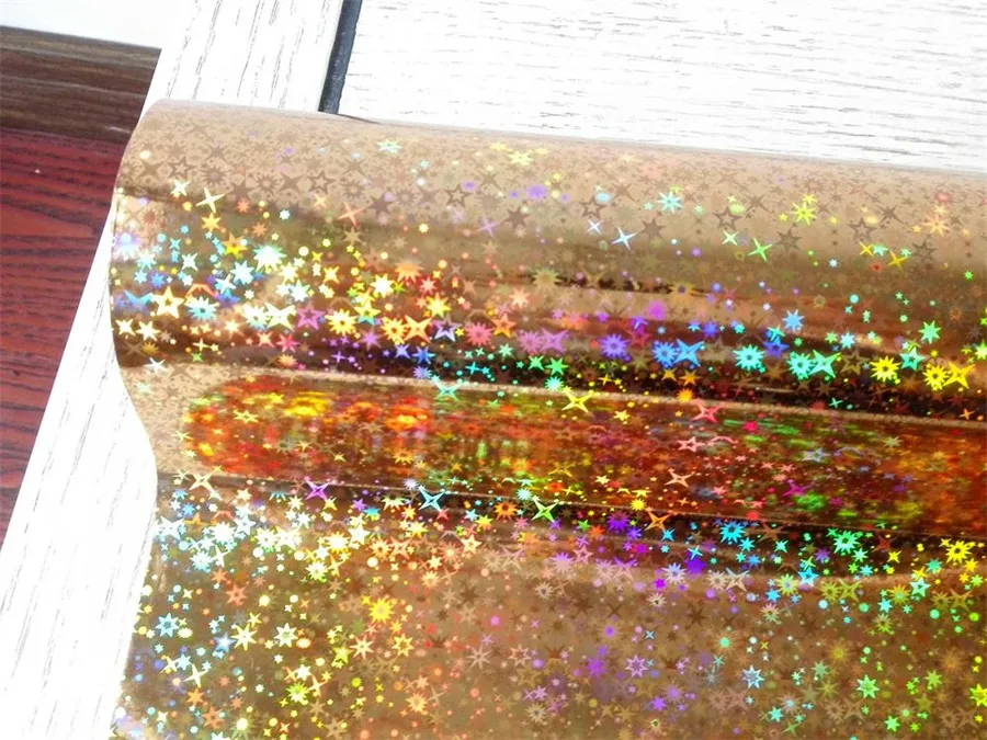 Vroče kovanje, folije holografski folijo zlatih zvezd glittery vzorec vroče pritisnite na papir ali plastično 21 cm x120m ali 64cm x 120 m