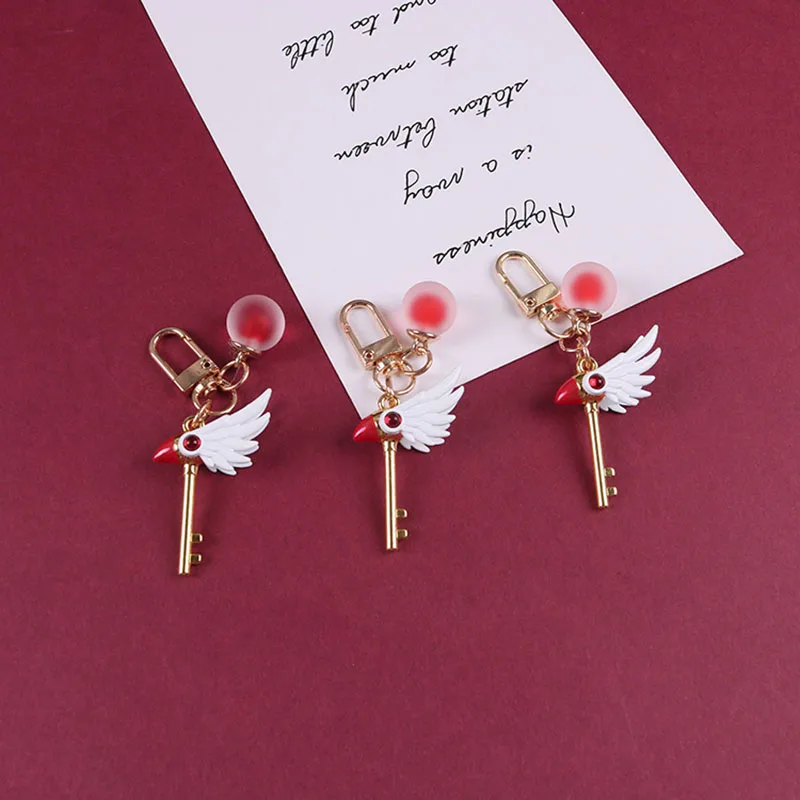 Moda 3D Dekle Sakura Različnih Sakura Čarobno Palico, Keychain Avto Vrečko Obesek ključe za Ženske Dekle Risanka Novo Leto Nakit